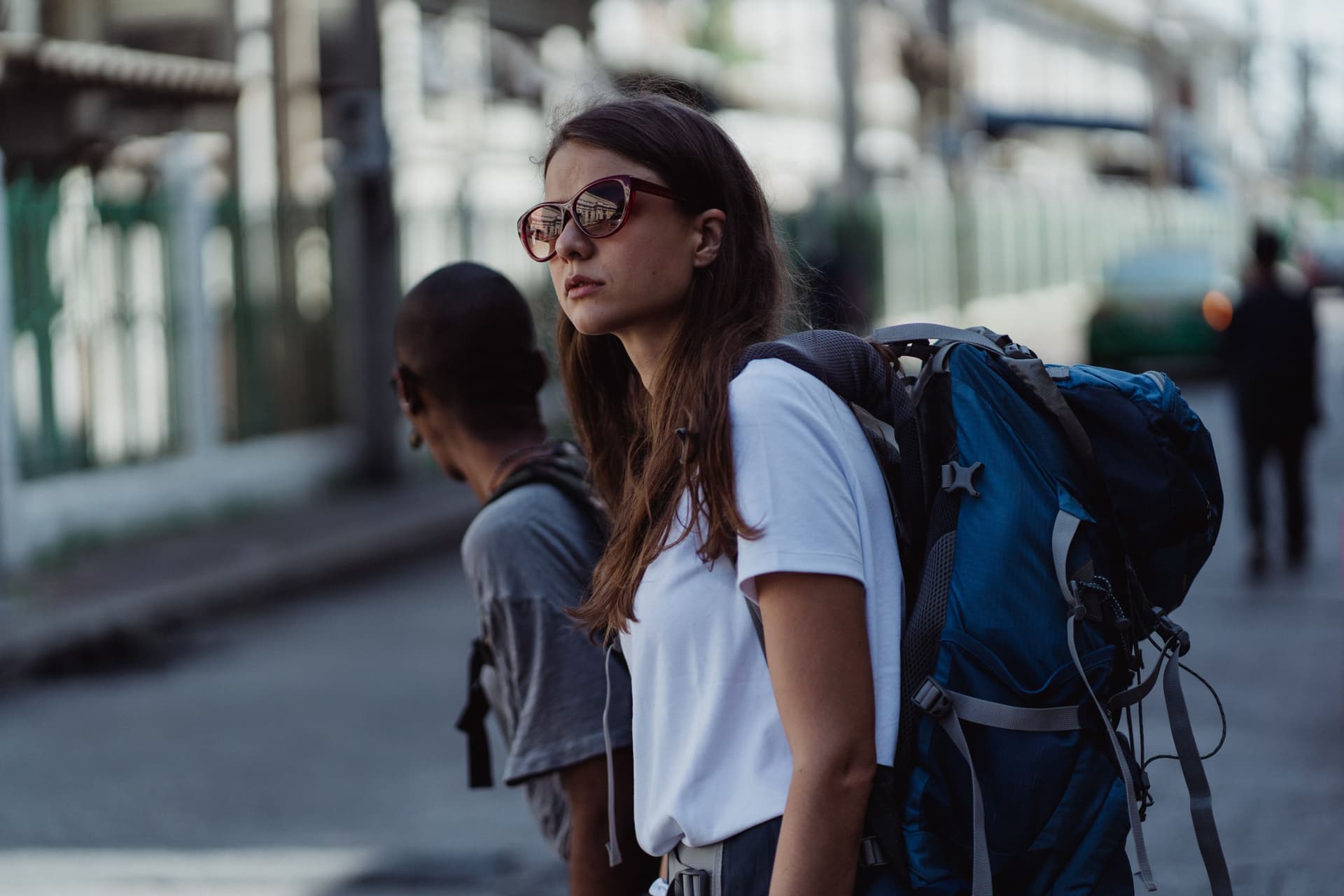 A woman traveler wearing a backpack